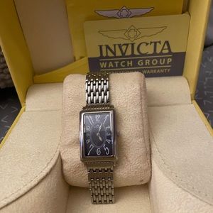 Perfect! Lady’s Invicta Watch-Square shaped with deep blue face and white #s.
